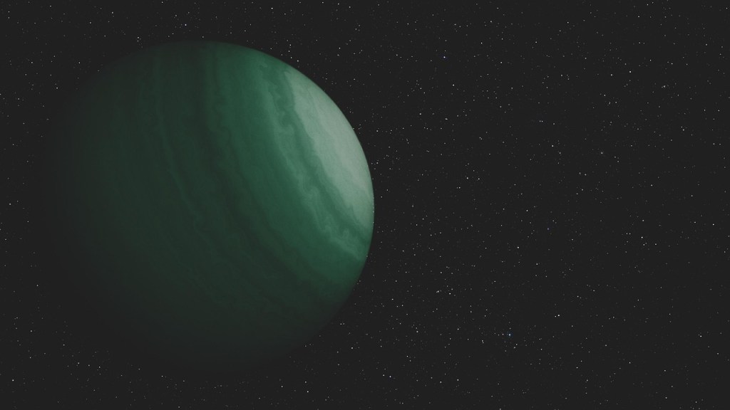 Green planet black background in space