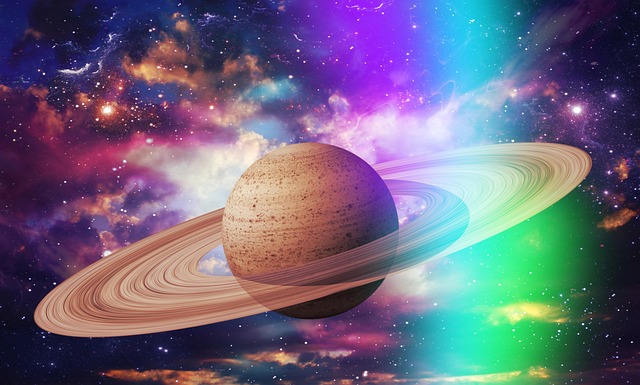 Saturn with colorful cloud exploding in the background